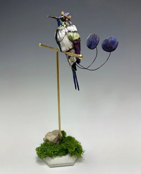 In Aztec mythology, the hummingbird is a prominent symbol associated with the god of war and the sun
