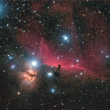 The Horsehead Nebula shines amid a star-filled cosmic landscape.