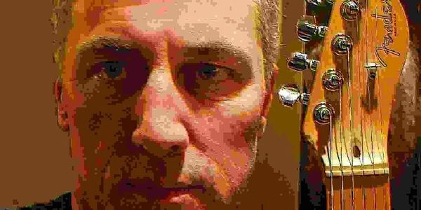 Artist with Fender Telecaster guitar headstock.