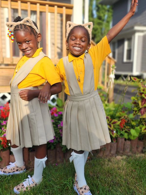 The Rugless Twins getting ready for school in their uniforms
