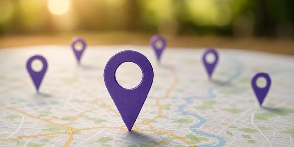 Purple map pins marking locations on a city map.