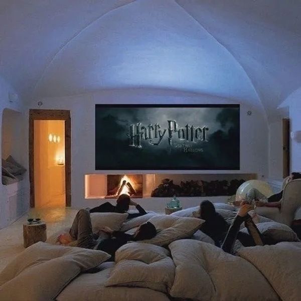 Cozy home theater with people watching Harry Potter together.