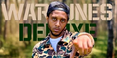 Man in camo jacket and cap points toward the camera with 'WAR ZONES DELUXE' text behind him.