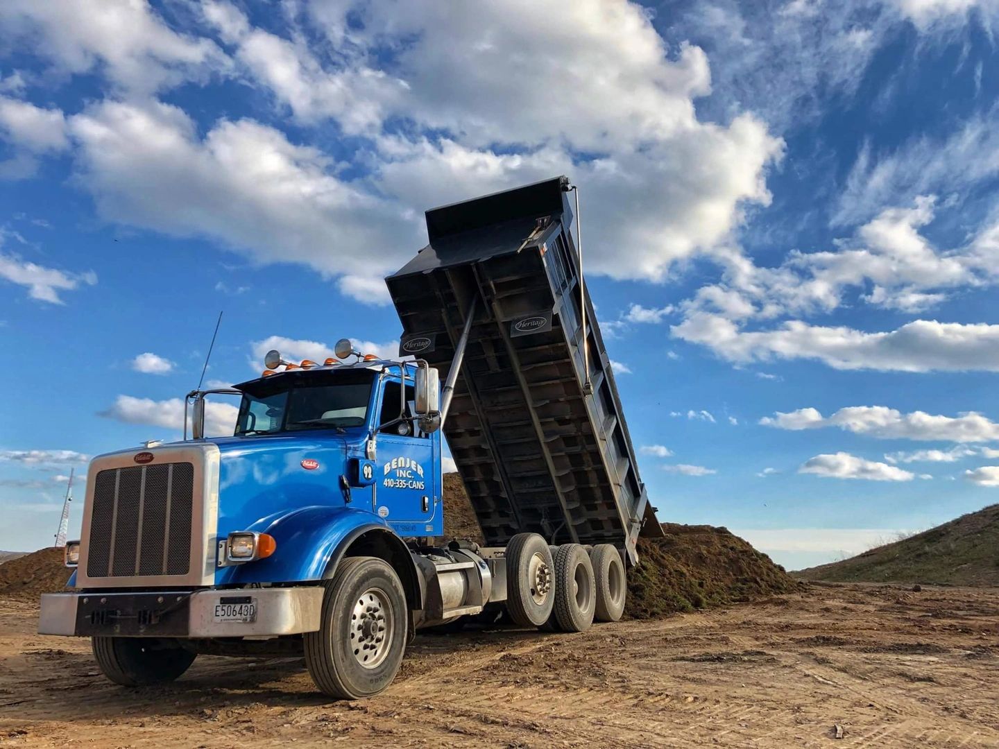 how much does a dump truck load of gravel cost ontario