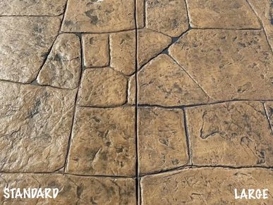 Stamped concrete with standard and large patterns.