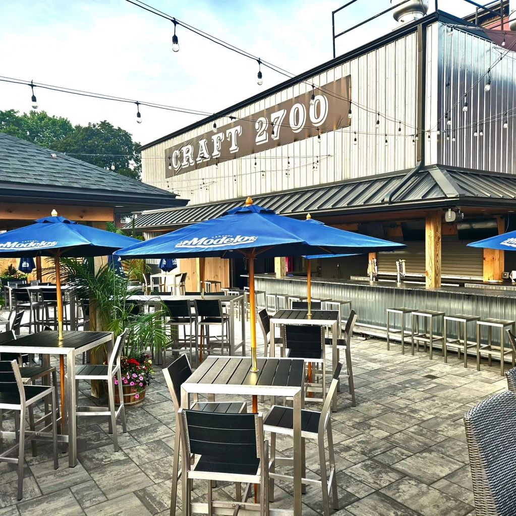 Our outdoor Patio with Covered Pavillion and bar seating for 35+.