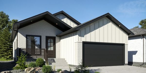 Modern single-story house with dark garage door and landscaped front yard.