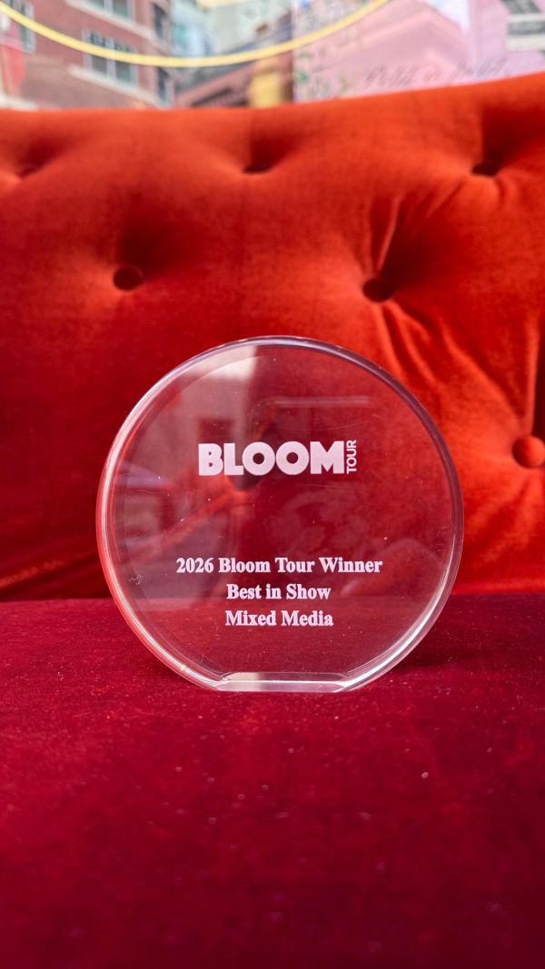 2026 Bloom Tour Best in Show award on red velvet.