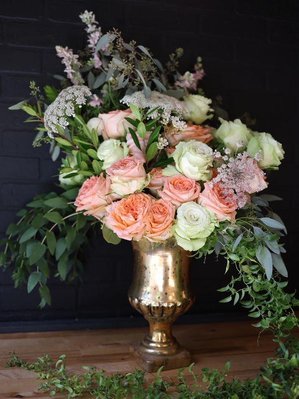 roses in gold vase, bridgerton flowers