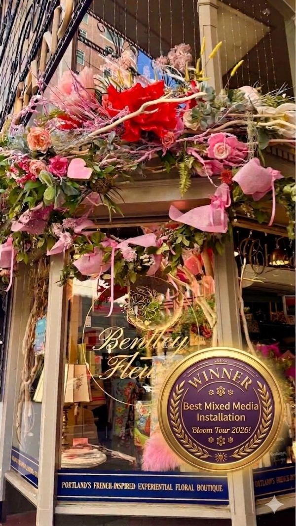 Floral storefront decor with award seal