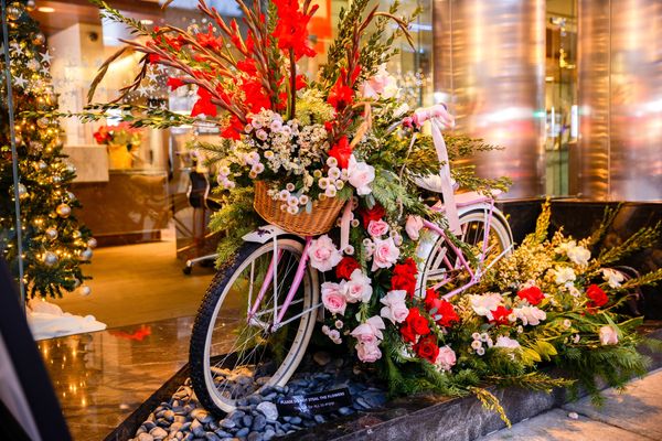 pink bike covered in flowers