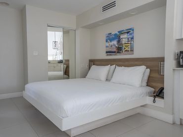 king size bed, at the Biscayne hotel
