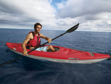 dad having fun kayaking