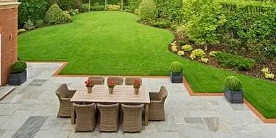 Full Garden Project. Patio with Contrast Border and freshly laid turf.