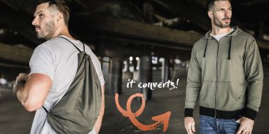 Two men in casual wear showcasing a convertible bag and jacket in an urban setting.