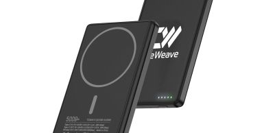 Two black portable power banks, one showing charging coil, the other with LED indicators.