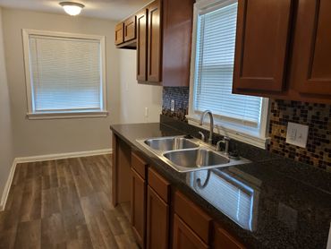 A rehabbed kitchen with appliances 