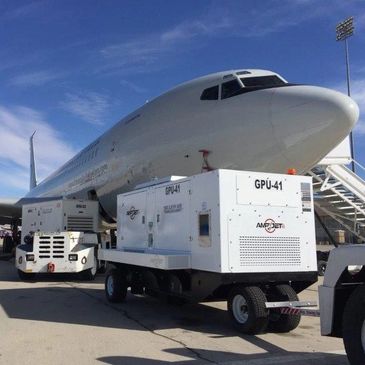 AMPJET 120 KVA aircraft GPU supplying power to an aircraft