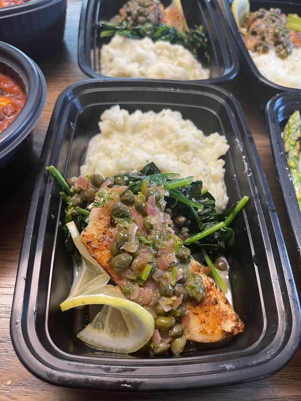 Low cab meal prep mashed cauliflower, spinach, and snapper with a lemon caper dill sauce