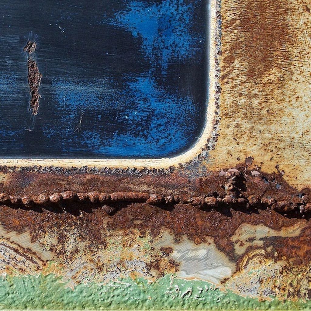 Photography close-up on an old 1963 VW Truck #6 in abstract series, textured, blues, green, rust...