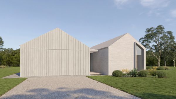 Modern house with two gable roofs and minimalist design.