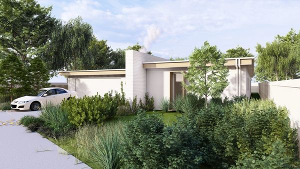 Modern house with lush garden and parked white car.