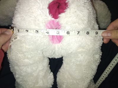 A large polar bear plushie with a pink vaginal SPH and a red anal SPH