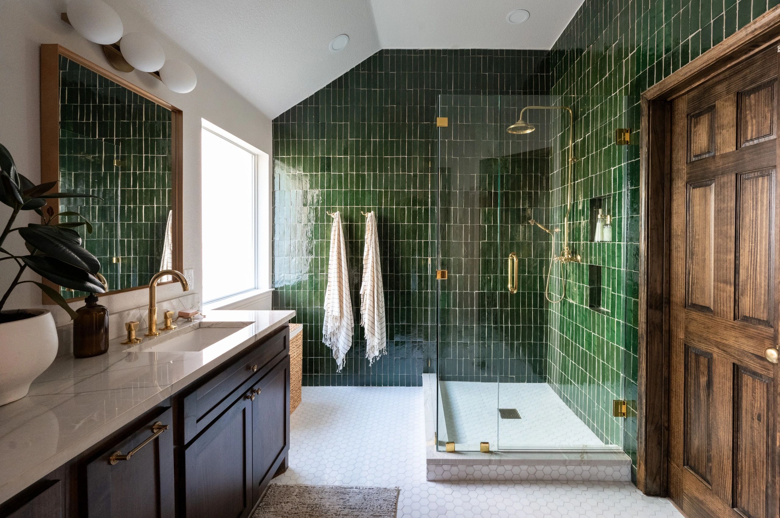 Green Zelliege tile, Stained wood door, marble mosaic floor, quartzite countertop