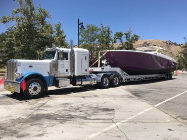Hauling Monique Magnum 50.  We have hauled her to Florida and back, to Newport Beach, and Delta.