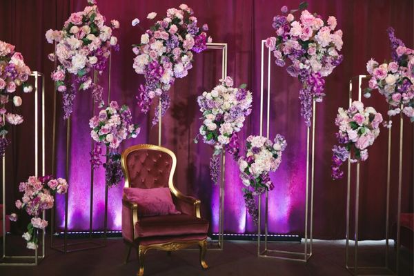 Pink, ivory, and lavender stage decor photo for wedding event