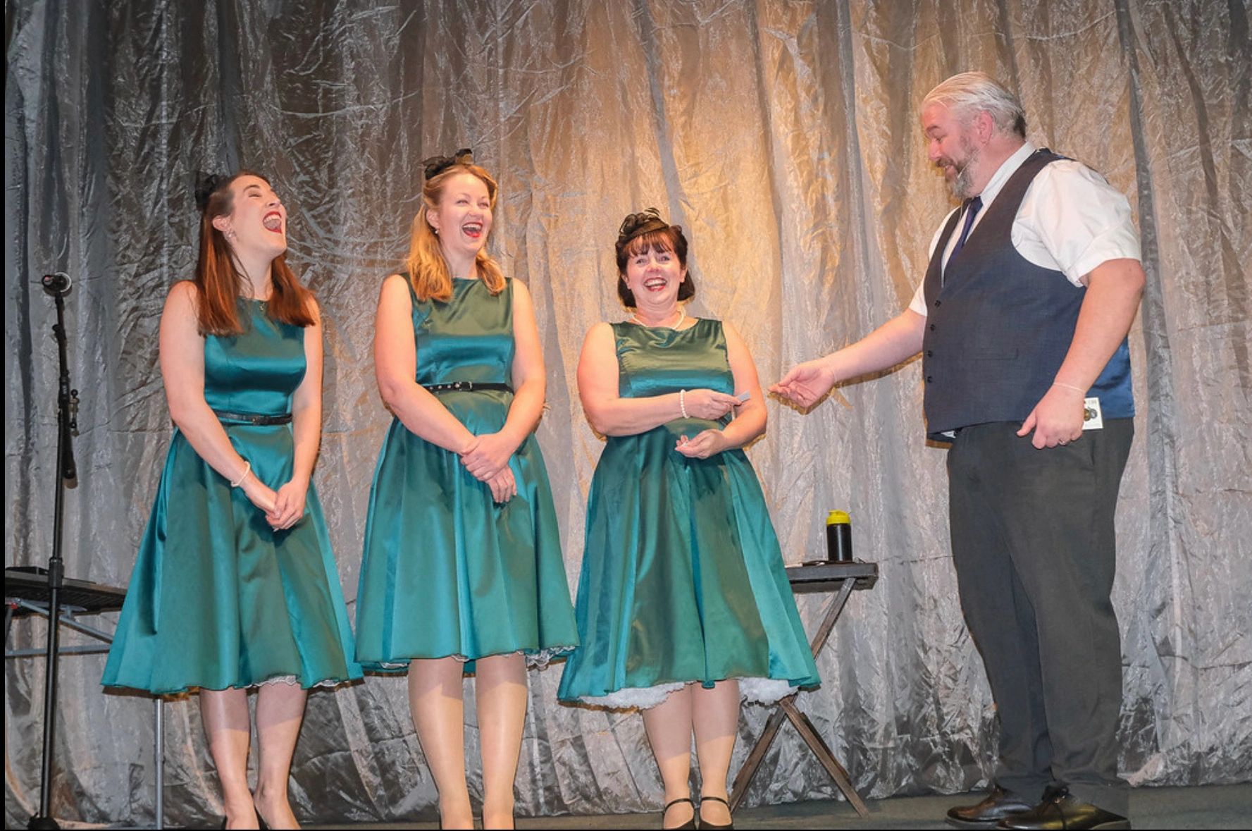 Perfoming stage magic at cerne abbas village hall for a private event