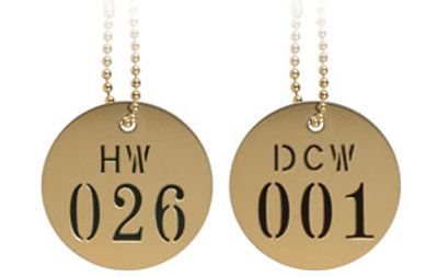 brass valve tags hanging from bead chain