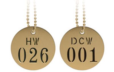 brass valve tags hanging from bead chain