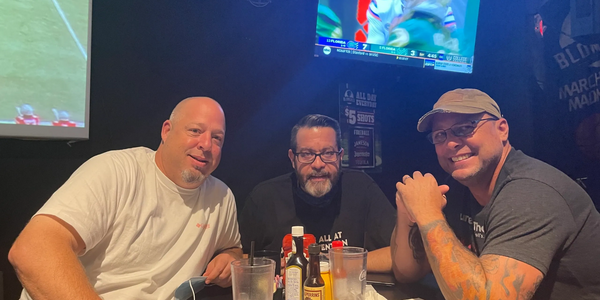 Josh, Scott, and Nick at a sports bar