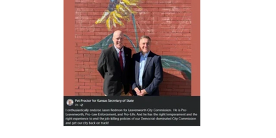 A two man wearing blazer and looking ahead