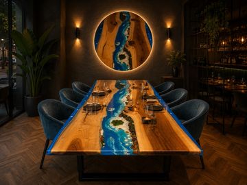 Elegant dining table with a blue river resin design and matching wall art.