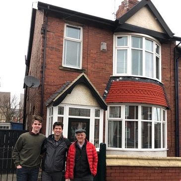 LtoR: Me, my dad, and my Grumps are standing outside my Grump's childhood Newcastle, ENG home.