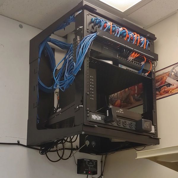 A neat, easy to understand network rack that Trans-IT Tech Services installed as replacement.