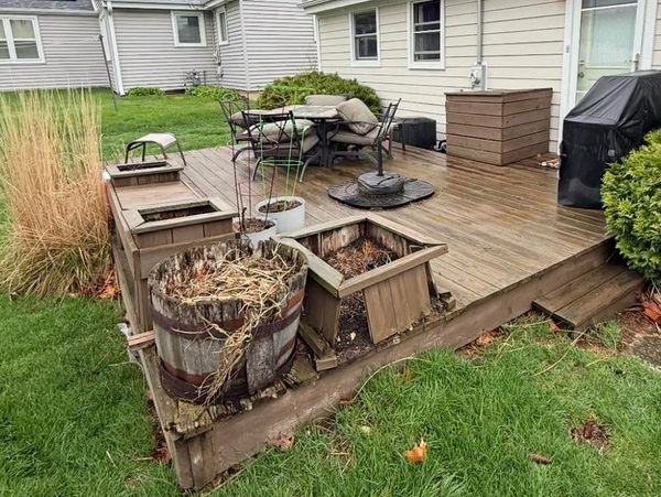 The original pressure treated deck that was replaced by Trex composite deck boards and white Trex Fa
