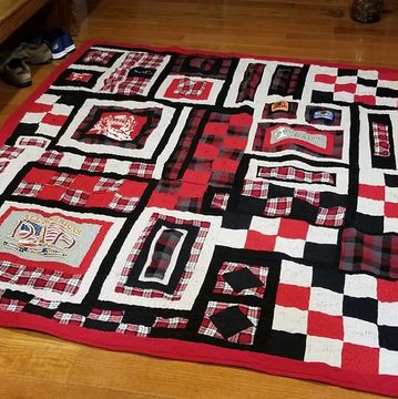 Memory quilt in Scarlet and Gray, Materials used were from flannel shirts, sweatshirts, T-shirts. 