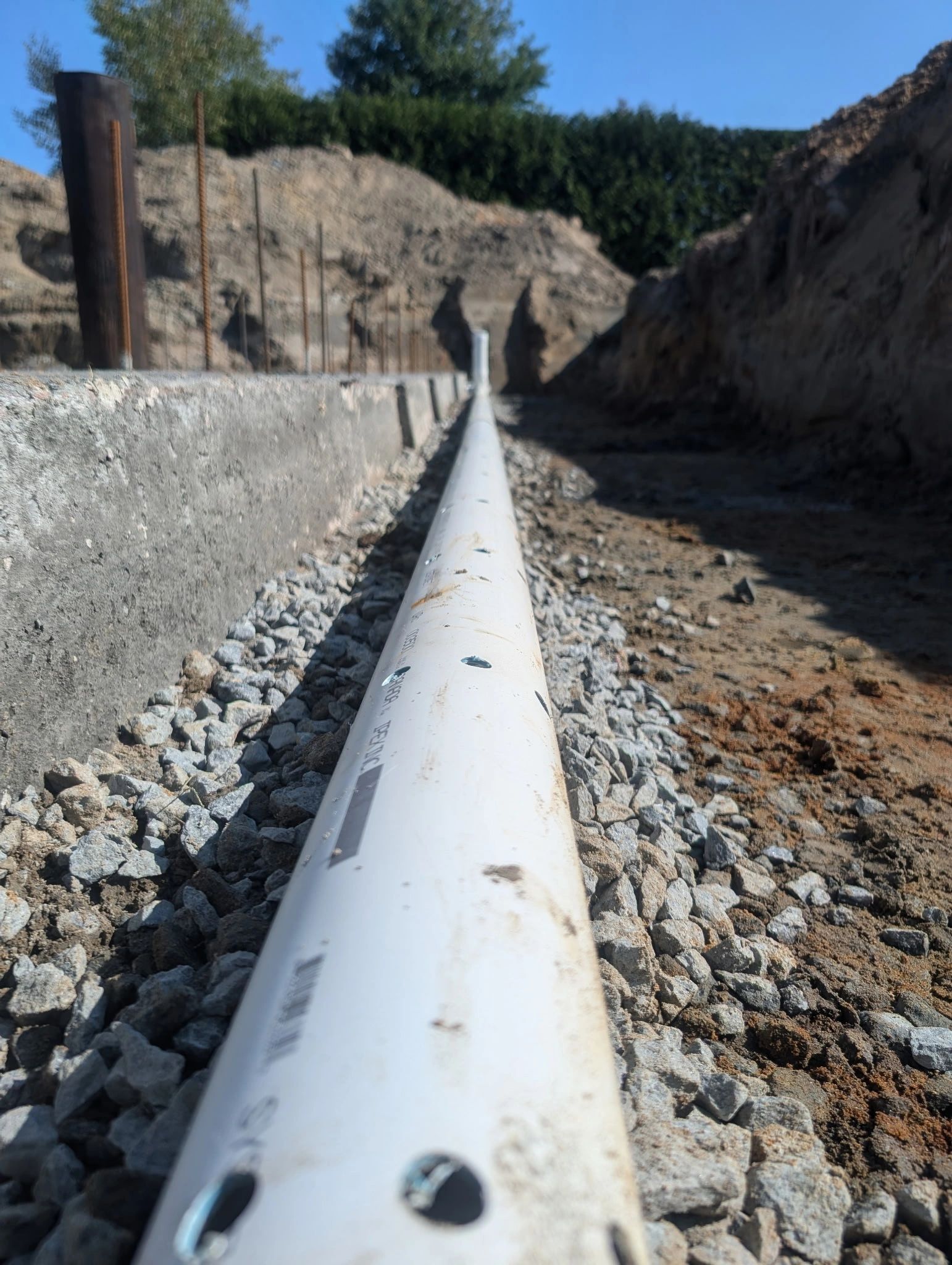 L’importance d’un drain perforé rigide pour le drain de fondation