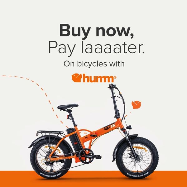 an orange fat tyre electric bike on a finance poster