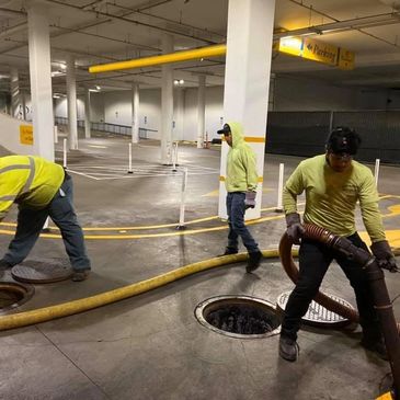 A vibrant landscape with mountains, trees, and a clear blue sky, showcasing the beauty of nature.