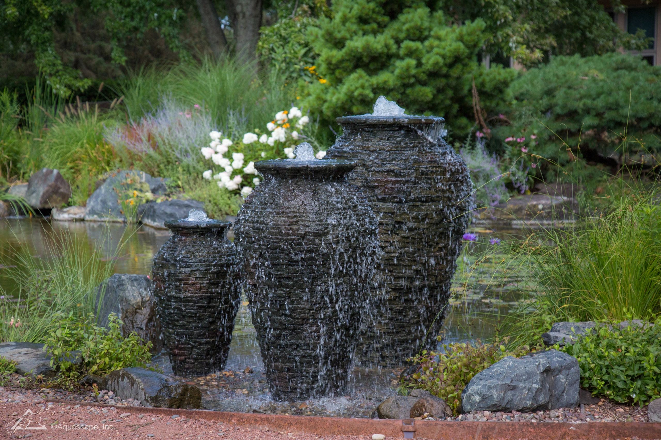 3 stacked slate Urns