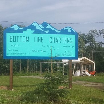 Photo of Bottom Line Charters sign