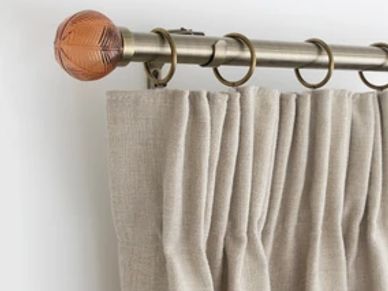 Brass curtain rail/rod with made to measure pencil pleat curtains 