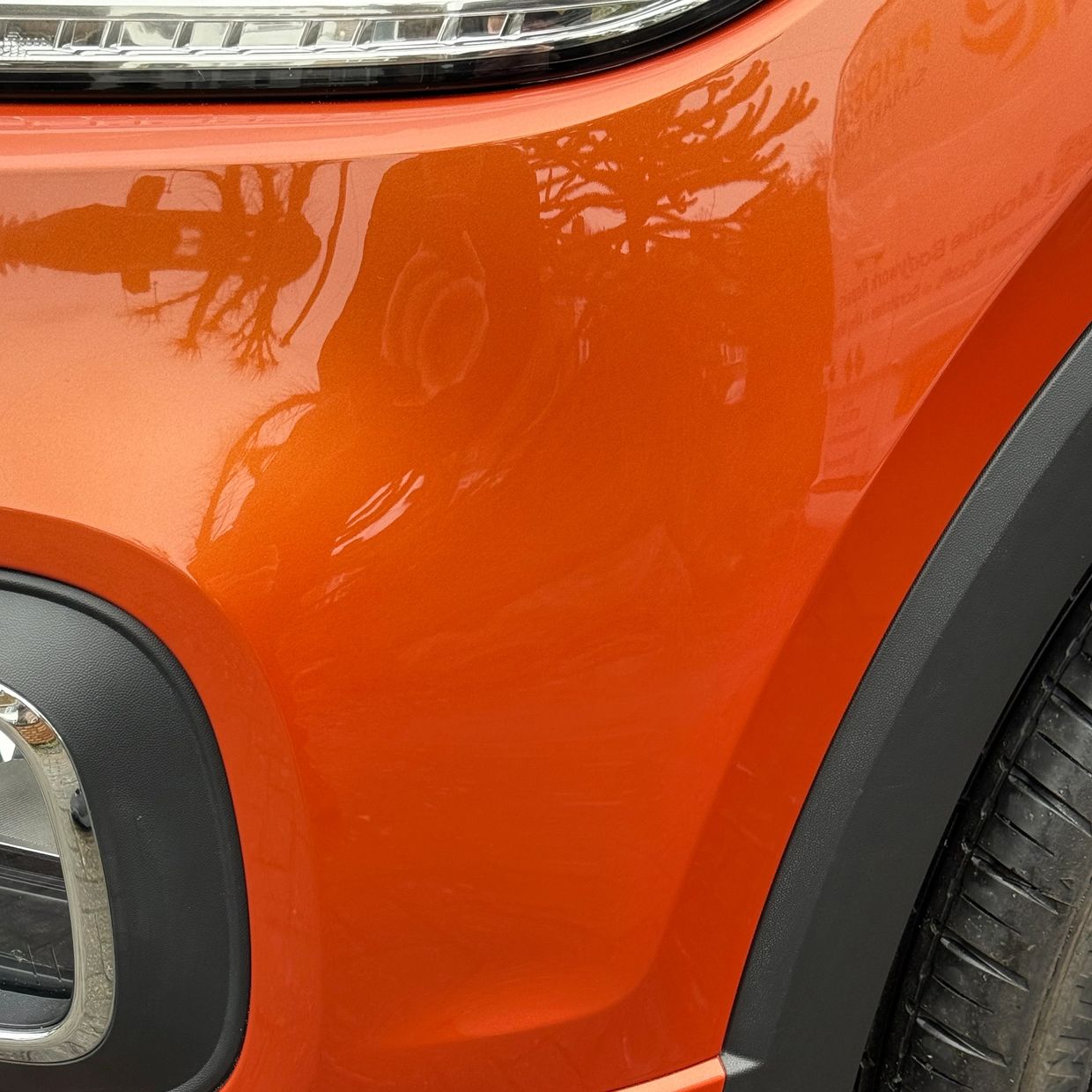 Repaired bumper corner on an orange car in Rugby, Warwickshire