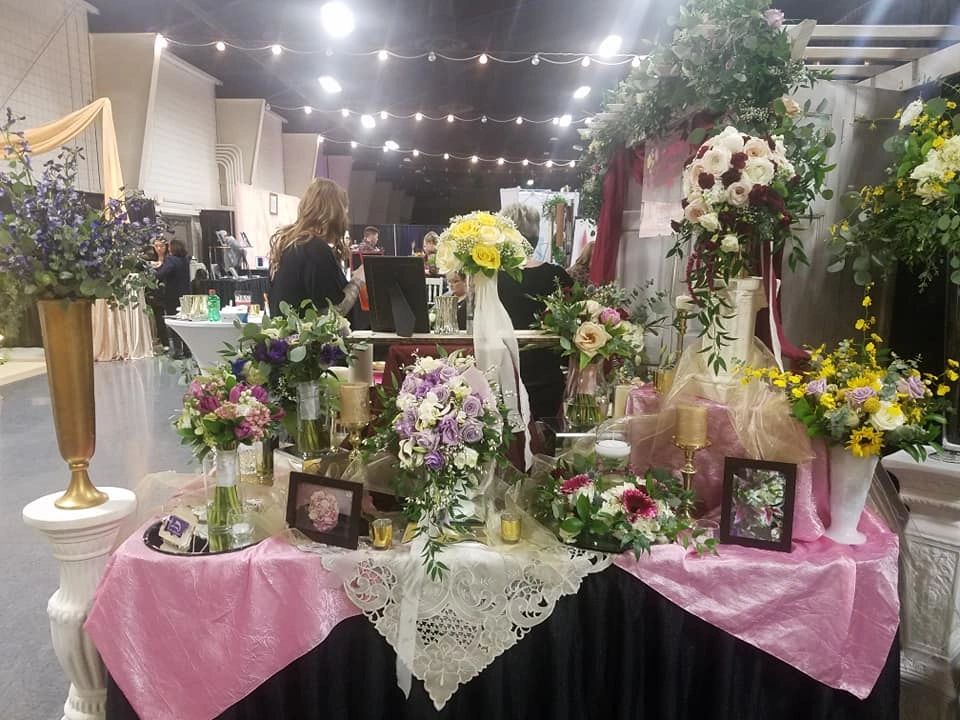 Wedding florals and décor displayed at a previous Ever & After Wedding Expo