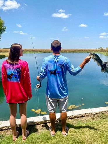 A man and a woman fishing together