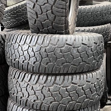 Stack of rugged off-road tires.